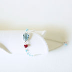 Blue gemstone Isla bracelet with silver-tone links and turquoise-colored bead accents.