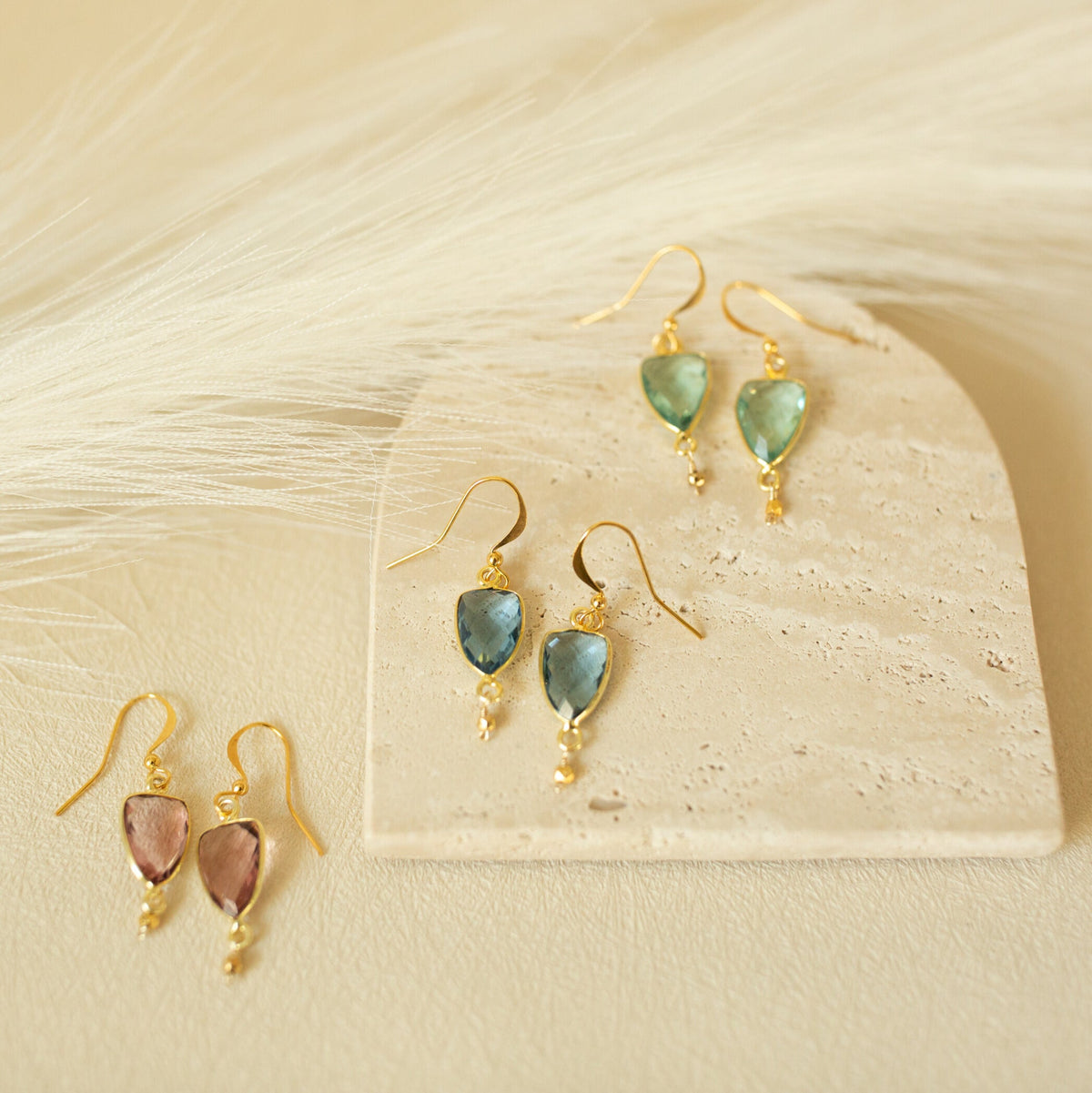 Isla drop earrings in pink, blue and pale green gemstone colors.