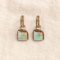 Square turquoise drops in rope-edged bronze settings