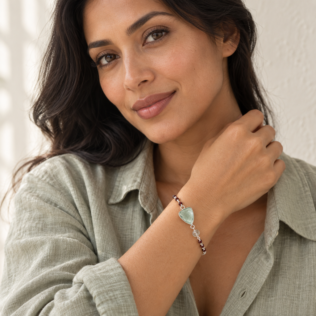 The Isla Bracelet — Green Amethyst / Silver / Rhodium Plated styled on a model; AI-generated lifestyle image.