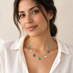 The Azzurra Necklace — 14k Gold Plated styled on a model; AI-generated lifestyle image.