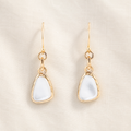 White mother-of-pearl drops suspended from bronze links and ear wires