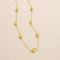 The Aurea fine gold-plated silver necklace with softly rounded gold stations