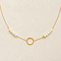 The Pearl — freshwater pearls, fine gold-plated silver chain and open circle in a refined ivory setting.