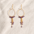 Teardrop gold-plated silver hoops with amethyst beads and fine chain tassels